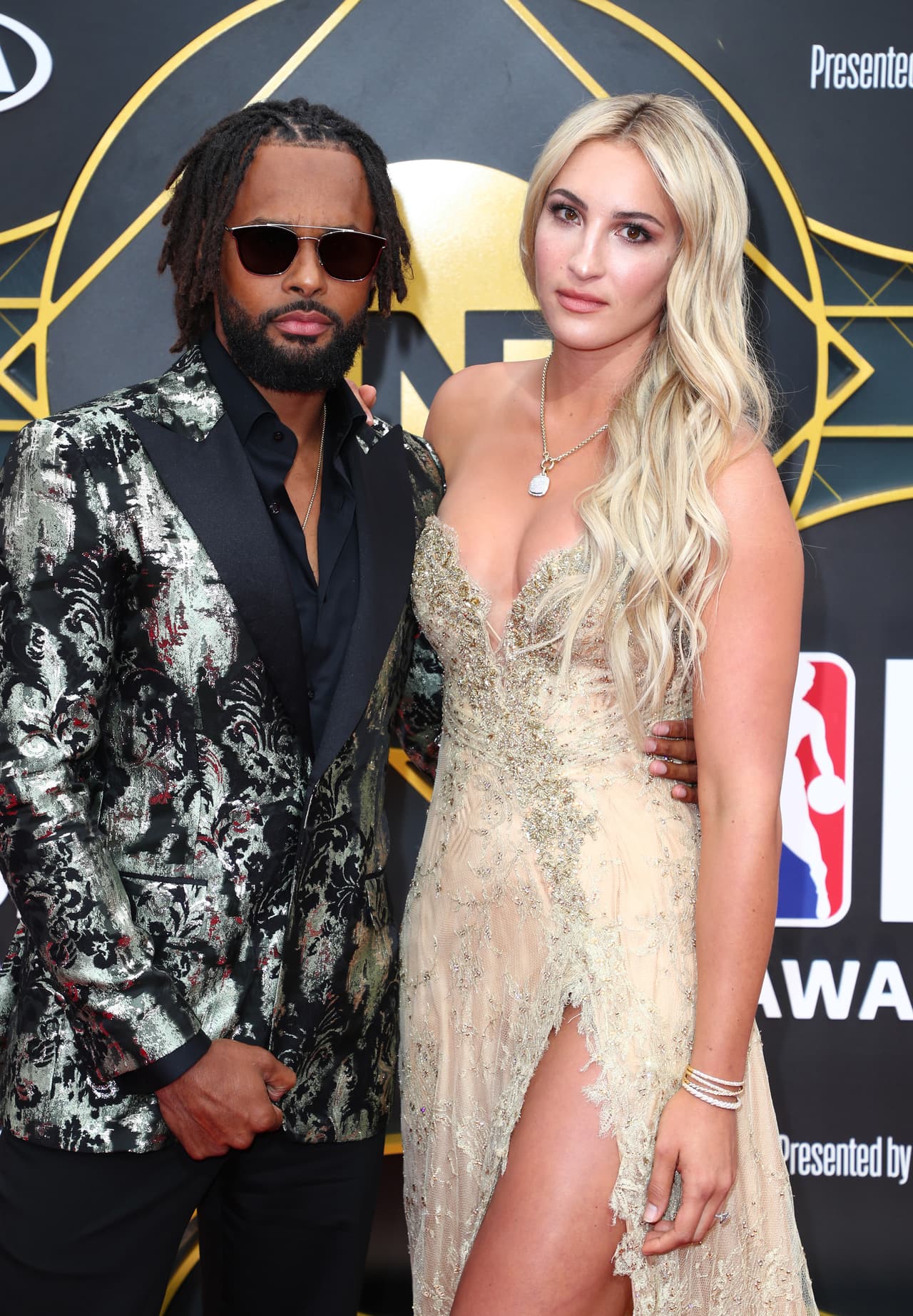 Patty Mills, exjugador de la NBA, y su pareja Alyssa Levesque.