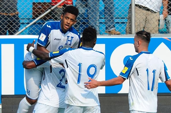Honduras' forward Anthony Lozano celebrates with teammates after scoring against Costa Rica during their 2018 FIFA World Cup qualifier football match in San Pedro Sula, Honduras on March 28, 2017. / AFP PHOTO / JOHAN ORDONEZ (Photo credit should read JOHAN ORDONEZ/AFP/Getty Images)