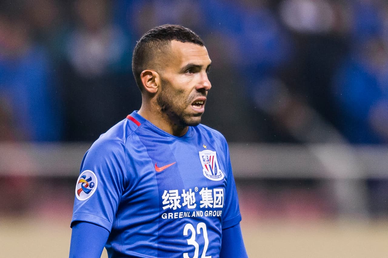 SHANGHAI, CHINA - FEBRUARY 08: Carlos Tevez of Shanghai Shenhua FC reacts during their AFC Champions League 2017 Playoff Stage match between Shanghai Shenhua FC (CHN) and Brisbane Roar (AUS) at the Hongkou Stadium, on 08 February 2017 in Shanghai, China. (Photo by Power Sport Images/Getty Images)