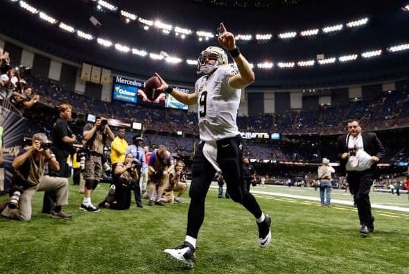 Drew Brees acumuló 293 yardas en pases, incluyendo dos touchdowns, y los Saints obtuvieron su primera victoria de la temporada al superar 20-9 a los Vikings.