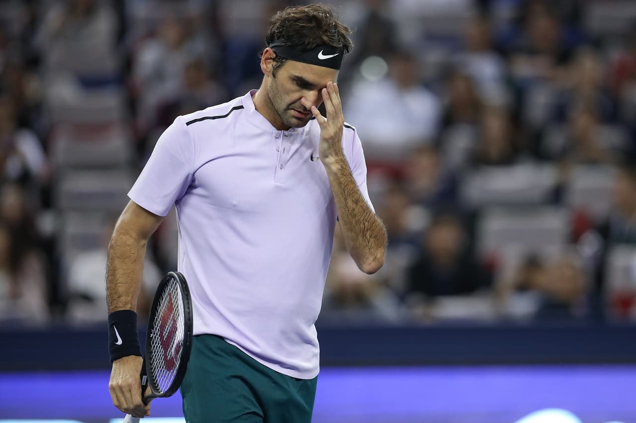 SHANGHAI, CHINA - OCTOBER 14: Roger Federer of Switzerland reacts after losing the point during the Men's singles Semifinal mach against Juan Martin del Potro of Argentina on day seven of 2017 ATP Shanghai Rolex Masters at Qizhong Stadium on October 14, 2017 in Shanghai, China. (Photo by Lintao Zhang/Getty Images)