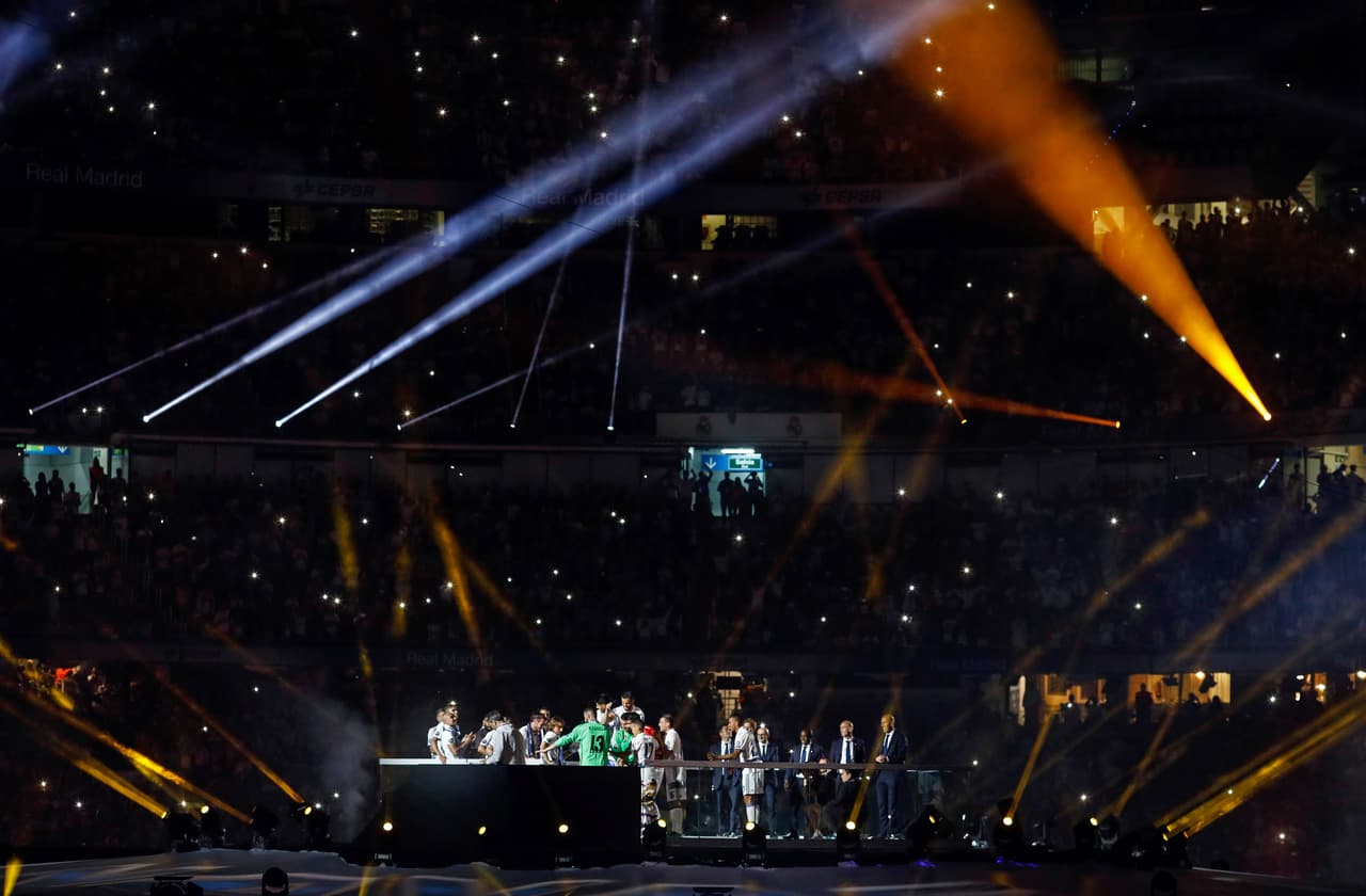 Real Madrid's team members jubilate during a celebration event held at the Santiago Bernabeu stadium after the team won the the UEFA Champions League football match final Juventus vs Real Madrid CF held at the National Stadium of Wales in Cardiff on June 3, 2017. / AFP PHOTO / OSCAR DEL POZO (Photo credit should read OSCAR DEL POZO/AFP/Getty Images)
