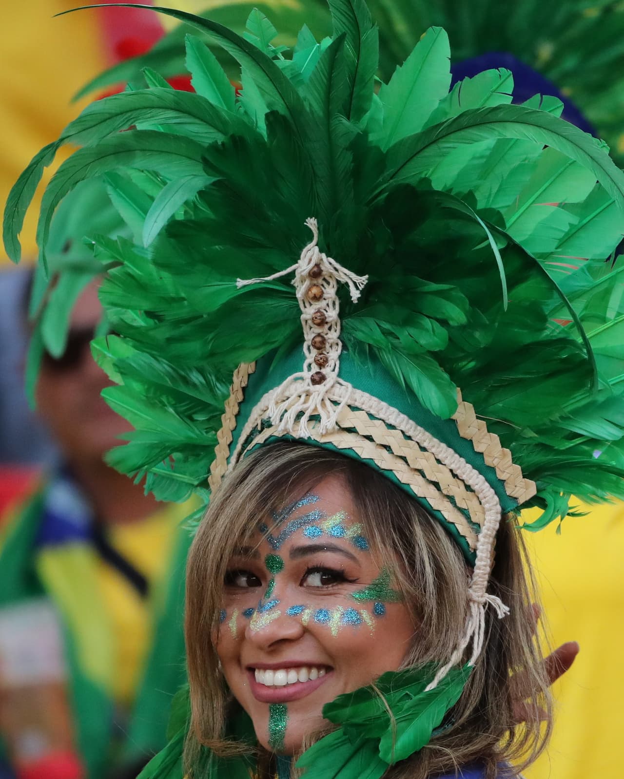 Moscow (Russian Federation), 27/06/2018.- A supporter of Brazil before the FIFA World Cup 2018 group E preliminary round soccer match between Serbia and Brazil in Moscow, Russia, 27 June 2018. (RESTRICTIONS APPLY: Editorial Use Only, not used in association with any commercial entity - Images must not be used in any form of alert service or push service of any kind including via mobile alert services, downloads to mobile devices or MMS messaging - Images must appear as still images and must not emulate match action video footage - No alteration is made to, and no text or image is superimposed over, any published image which: (a) intentionally obscures or removes a sponsor identification image; or (b) adds or overlays the commercial identification of any third party which is not officially associated with the FIFA World Cup) (Mundial de Fútbol, Brasil, Moscú, Rusia) EFE/EPA/ABEDIN TAHERKENAREH EDITORIAL USE ONLY