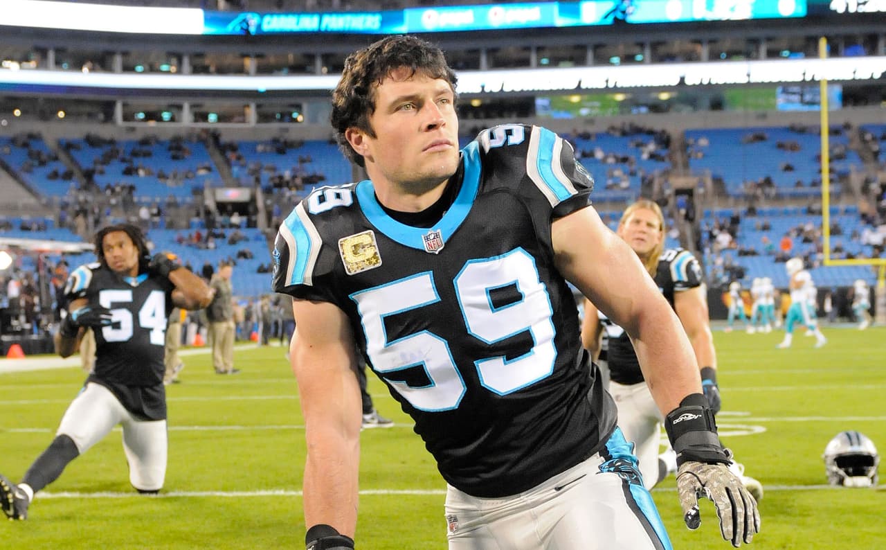 Carolina Panthers middle linebacker Luke Kuechly (59) warms up before an NFL football game, between the Carolina Panthers and the Miami Dolphins in Charlotte, N.C., Monday, Nov. 13, 2017. (AP Photo/Mike McCarn)