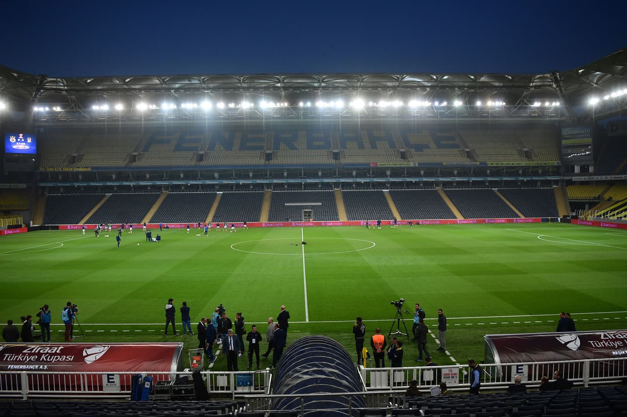 Fenerbahce's players warm up prior to the rescheduled Turkish Cup semi second leg final football match between Fenerbahce and Besiktas on May 3, 2018 at Sukru Saracoglu Stadium in Istanbul. - The match, a Turkish Cup semi-final second leg at Fenerbahce's ground on April 19, was abandoned in the 57th minute after Besiktas coach Senol Gunes was hit by an object hurled out of the stands. (Photo by OZAN KOSE / AFP) (Photo credit should read OZAN KOSE/AFP/Getty Images)