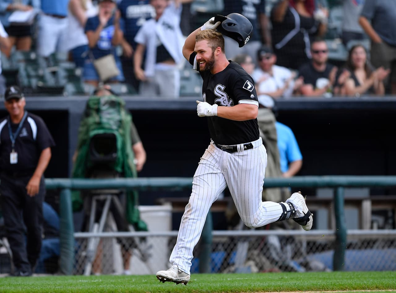 CHICAGO, IL - SEPTEMBER 03: Chicago White Sox first baseman Matt Davidson (24) rounds the bases and throws his helmet after his walk off two run home run ball leave the park against the Detroit Tigers on September 3, 2018 at Guaranteed Rate Field in Chicago, Illinois. (Photo by Quinn Harris/Icon Sportswire via Getty Images)