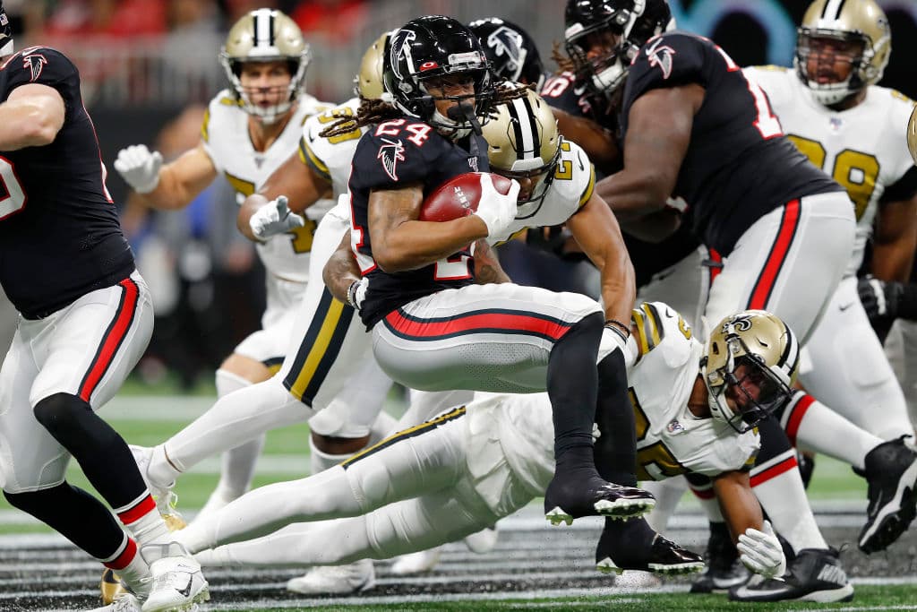 Tras vencer a los Falcons 26-18, en el último partido de la jornada de Acción de Gracias, son el primer equipo en clasificarse a playoffs.