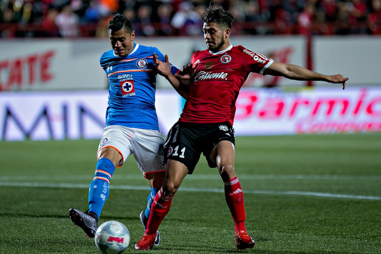 Action photo during the match Tijuana vs Cruz Azul at Caliente Stadium, 2016 Clausura, Liga BBVA Bancomer MX. Foto de accion durante el Partido Tijuana vs Cruz Azul en el Estadio Caliente. Partido Correspondiente a la Jornada 5 del Torneo Clausura 2016, Liga BBVA Bancomer MX, en la foto: (i)-(d) Julio Cesar Dominguez, Henry Martin 05/02/2016/MEXSPORT/ Emiliano