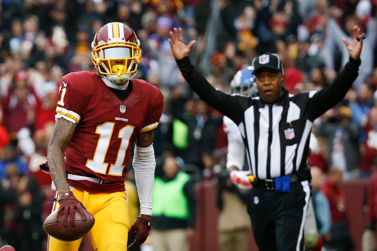 Los Washington Redskins empataron a los New York Giants al tope del Este de la NFC al vencerlos 20-14 en la semana 12, estas son las mejores imágenes de este reñido encuentro.