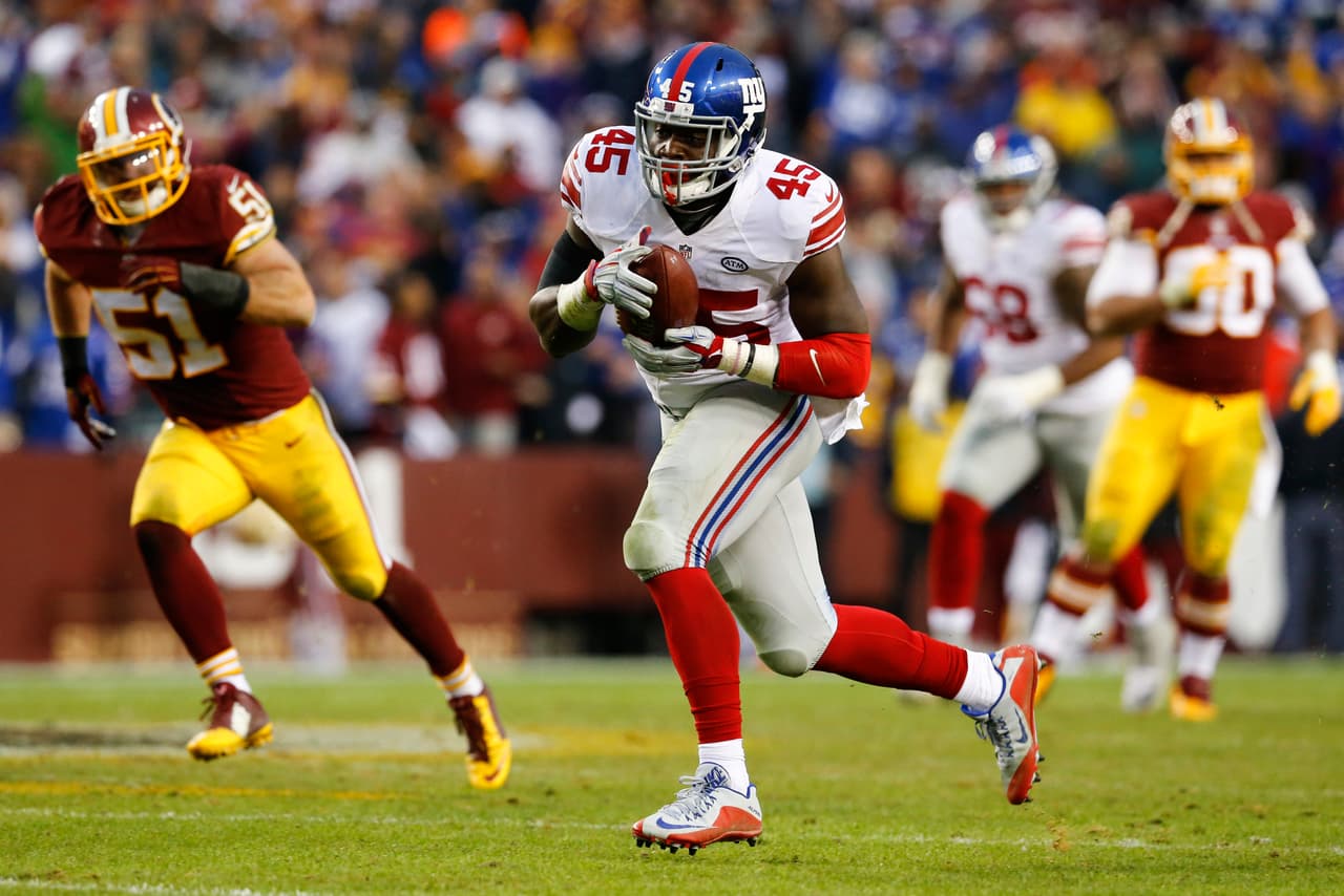 Los Washington Redskins empataron a los New York Giants al tope del Este de la NFC al vencerlos 20-14 en la semana 12, estas son las mejores imágenes de este reñido encuentro.