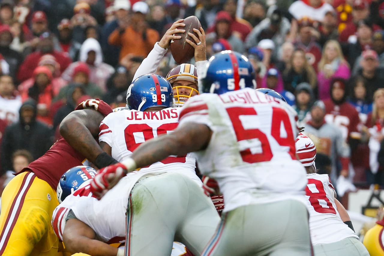 Los Washington Redskins empataron a los New York Giants al tope del Este de la NFC al vencerlos 20-14 en la semana 12, estas son las mejores imágenes de este reñido encuentro.