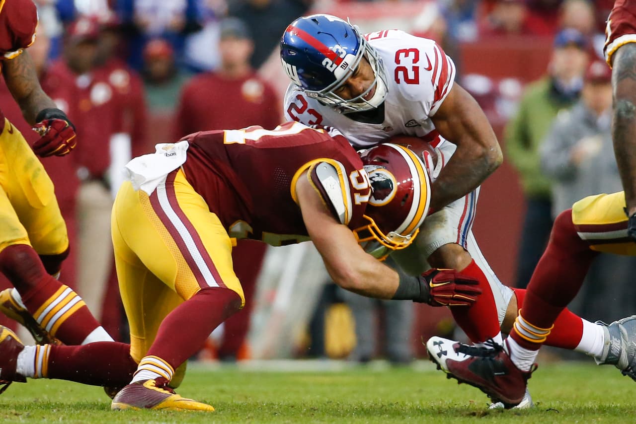 Los Washington Redskins empataron a los New York Giants al tope del Este de la NFC al vencerlos 20-14 en la semana 12, estas son las mejores imágenes de este reñido encuentro.