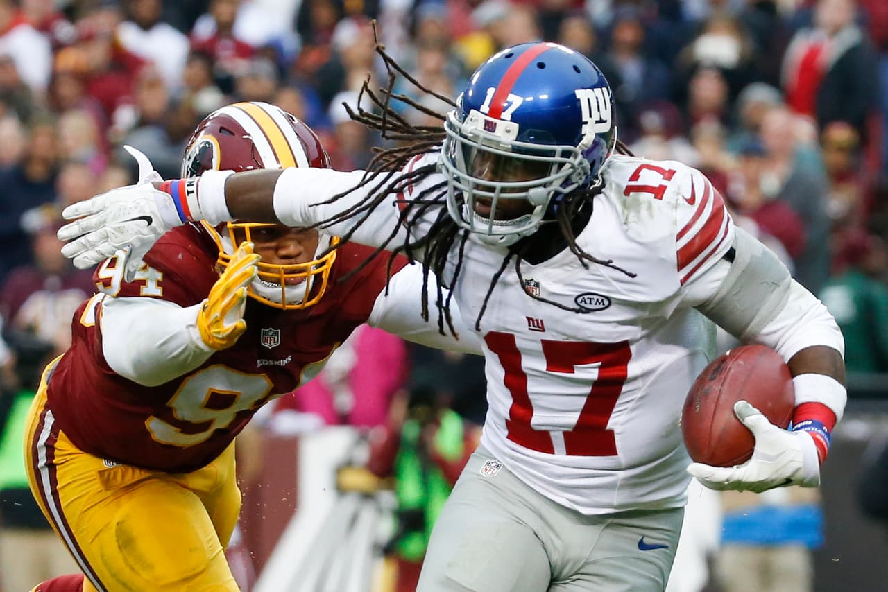 Los Washington Redskins empataron a los New York Giants al tope del Este de la NFC al vencerlos 20-14 en la semana 12, estas son las mejores imágenes de este reñido encuentro.
