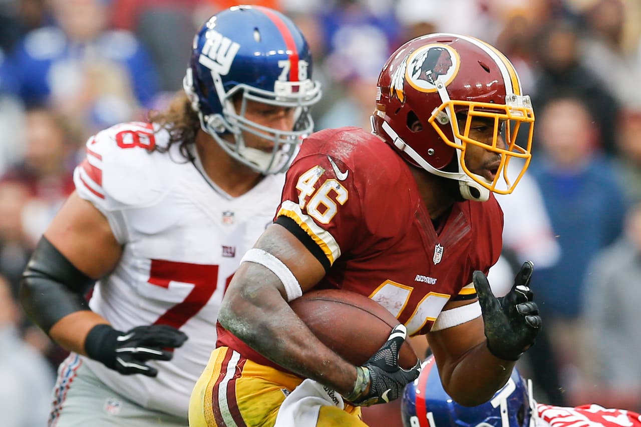 Los Washington Redskins empataron a los New York Giants al tope del Este de la NFC al vencerlos 20-14 en la semana 12, estas son las mejores imágenes de este reñido encuentro.