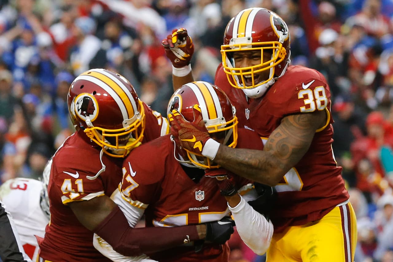 Los Washington Redskins empataron a los New York Giants al tope del Este de la NFC al vencerlos 20-14 en la semana 12, estas son las mejores imágenes de este reñido encuentro.
