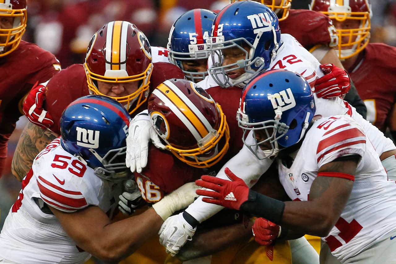 Los Washington Redskins empataron a los New York Giants al tope del Este de la NFC al vencerlos 20-14 en la semana 12, estas son las mejores imágenes de este reñido encuentro.