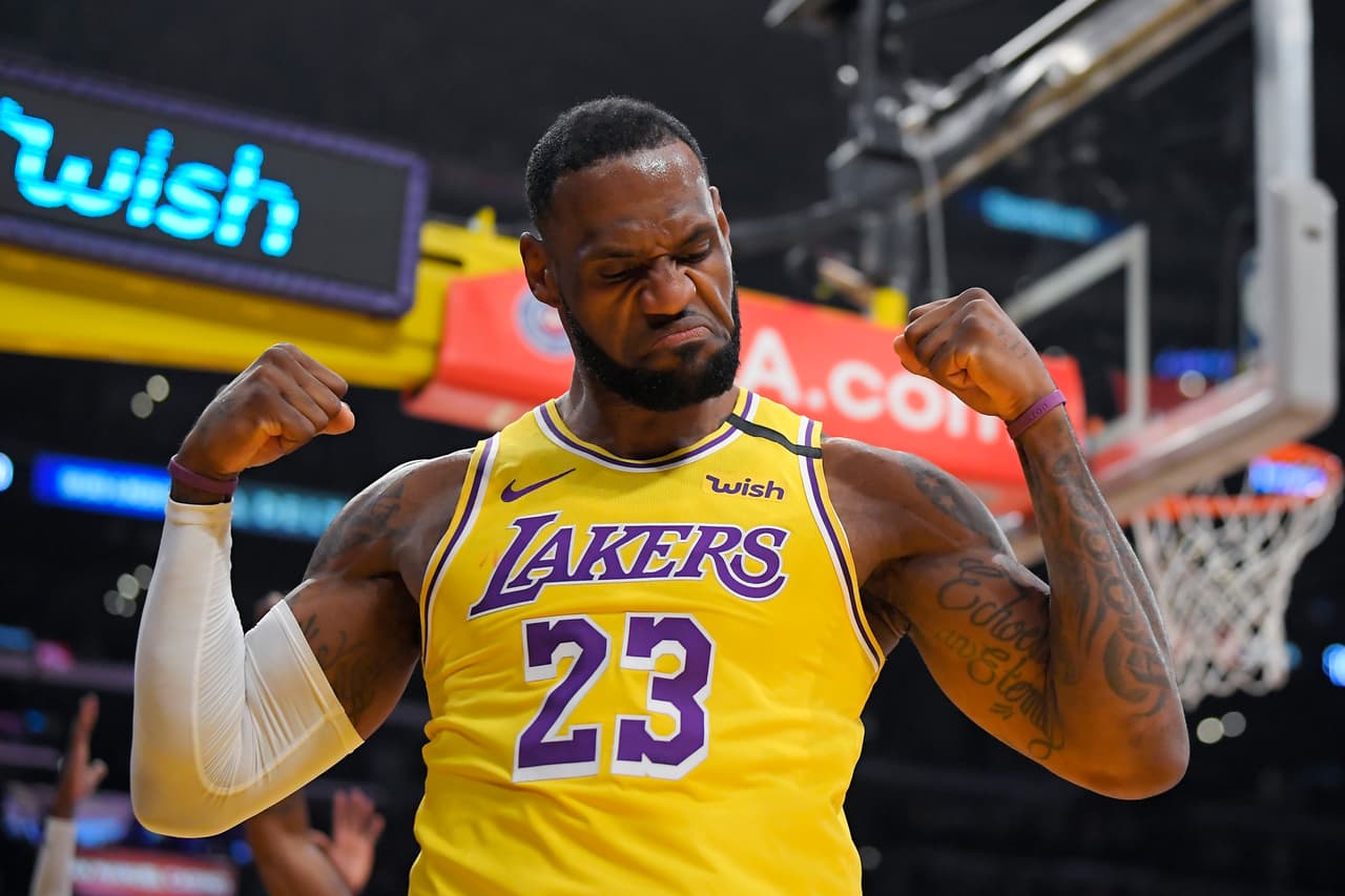 Los Angeles Lakers forward LeBron James gestures after scoring and drawing a foul during the first half of the team's NBA basketball game against the New York Knicks on Tuesday, Jan. 7, 2020, in Los Angeles. (AP Photo/Mark J. Terrill)