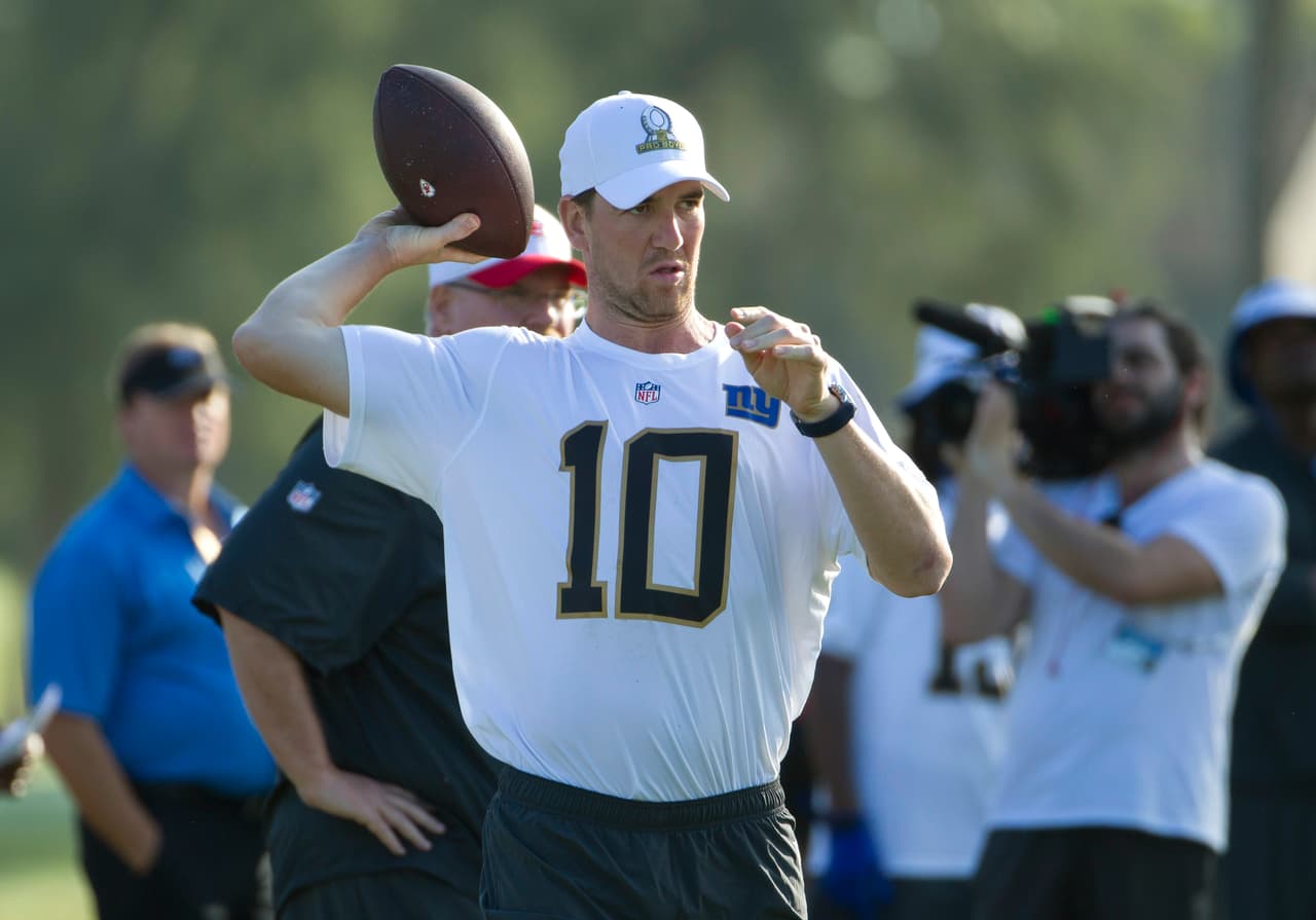 Eli Manning con el equipo Rice.