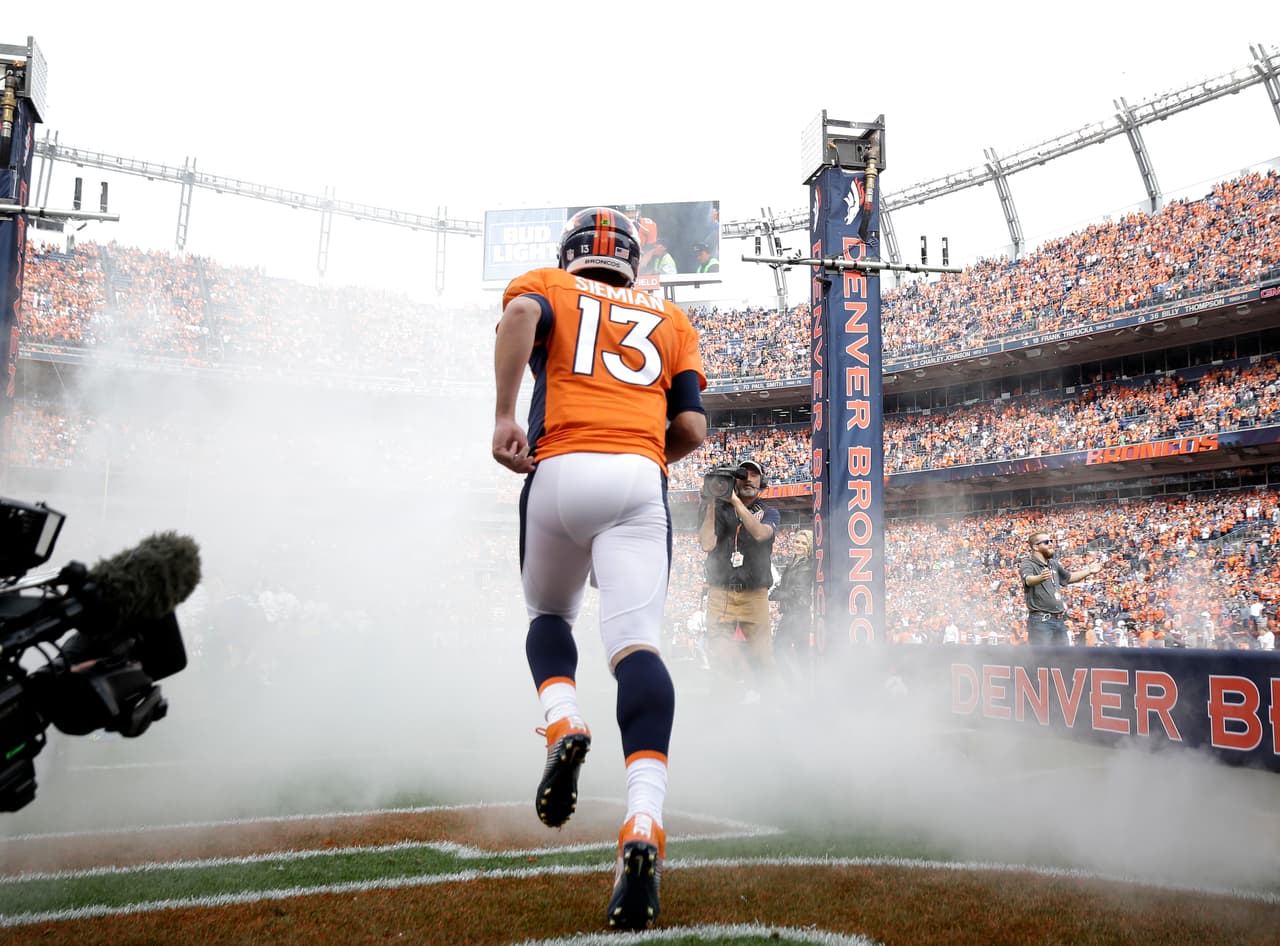 Denver Broncos quarterback Trevor Siemian (13) takes the field prior to an NFL football game against the San Diego Chargers, Sunday, Oct. 30, 2016, in Denver. (AP Photo/Jack Dempsey)