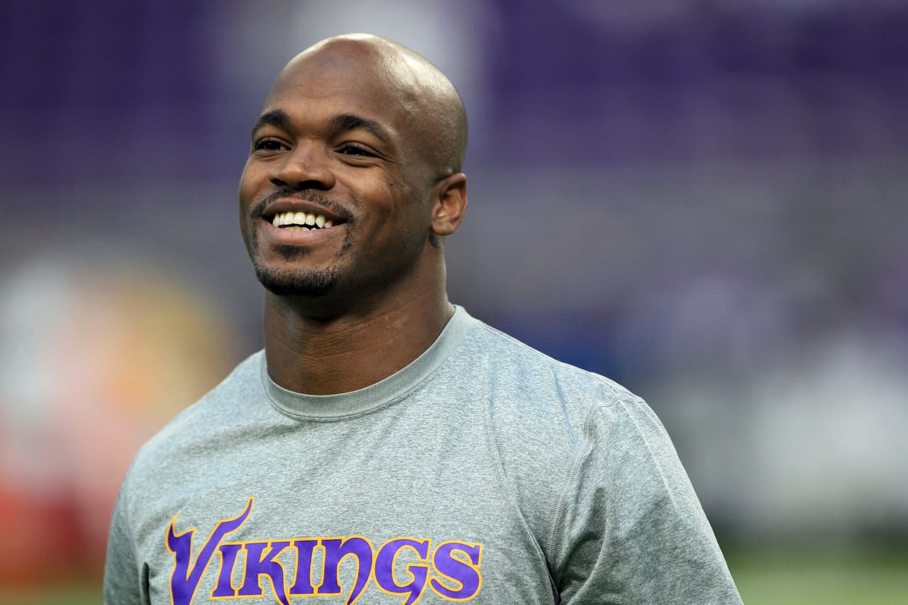 Minnesota Vikings running back Adrian Peterson warms up before the start of an NFL football game between the Indianapolis Colts and the Minnesota Vikings Sunday, Dec. 18, 2016, in Minneapolis. (AP Photo/Andy Clayton-King)