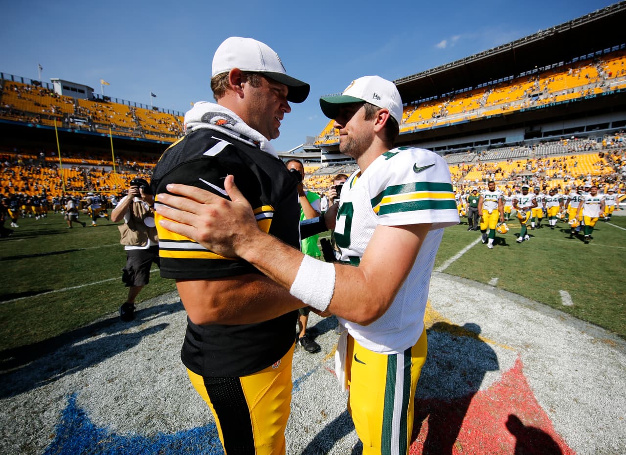 Pittsburgh Steelers quarterback Ben Roethlisberger (7) and Green Bay Packers quarterback Aaron Rodgers (12) during the NFL preseason game on Sunday, Aug. 23, 2015 in Pittsburgh. The Steelers won, 24-19. (Ric Tapia via AP)