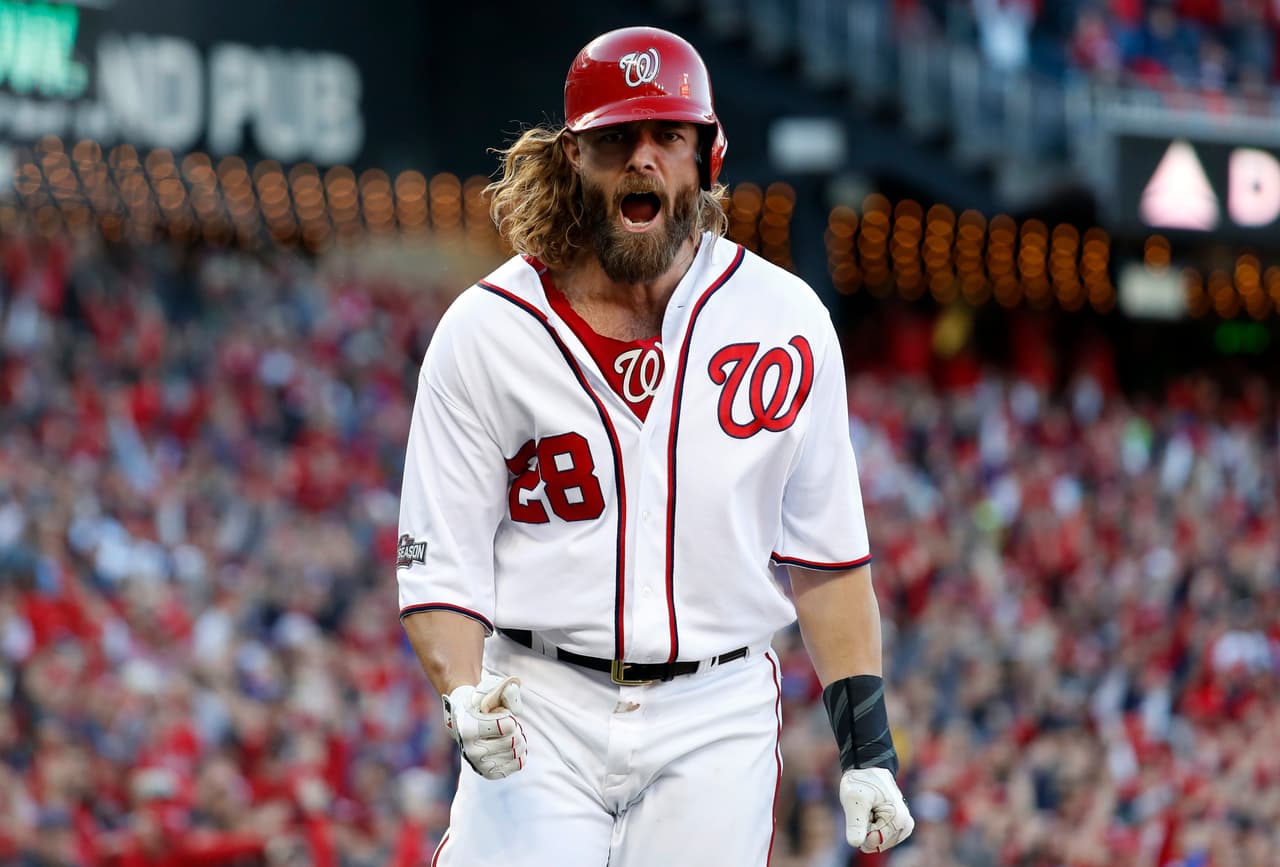 Washington Nationals' Jayson Werth celebrates after scoring on a single by Daniel Murphy during the seventh inning of Game 2 of baseball's National League Division Series against the Los Angeles Dodgers at Nationals Park, Sunday, Oct. 9, 2016, in Washington. (AP Photo/Alex Brandon)