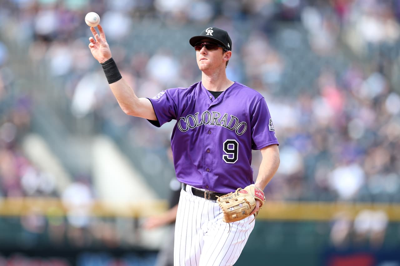 DENVER, CO - SEPTEMBER 27: DJ LeMahieu #22 of the Colorado Rockies plays second base during the game against the Philadelphia Phillies at Coors Field on September 27, 2018 in Denver, Colorado. The Rockies defeated the Phillies 6-4. (Photo by Rob Leiter/MLB Photos via Getty Images)