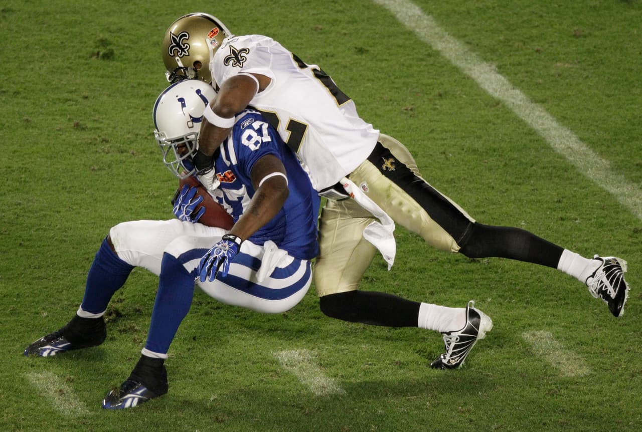 SUPER BOWL XLIV Reggie Wayne y Dallas Clark - receptores - Indianapolis Colts. Ambos fueron los principales receptores de Peyton Manning en la temporada regular, con más de 100 atrapadas y 10 touchdowns entre los dos. En el Super Bowl XLIV Wayne solo tuvo 5 recepciones para 46 yardas y Clark 7 para 86, ninguno anotó.