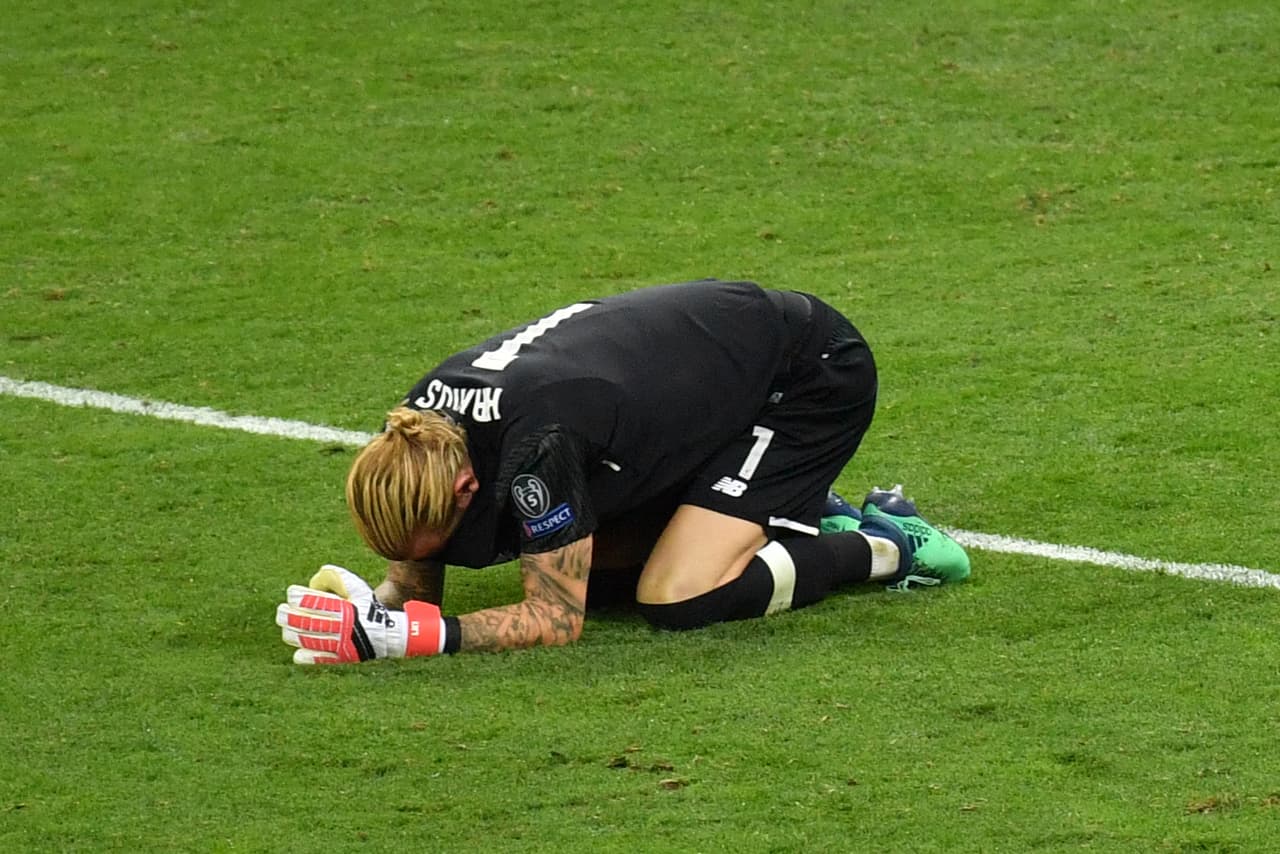 Liverpool's German goalkeeper Loris Karius kneels on the pitch after the UEFA Champions League final football match between Liverpool and Real Madrid at the Olympic Stadium in Kiev, Ukraine on May 26, 2018. (Photo by Sergei SUPINSKY / AFP) (Photo credit should read SERGEI SUPINSKY/AFP/Getty Images)