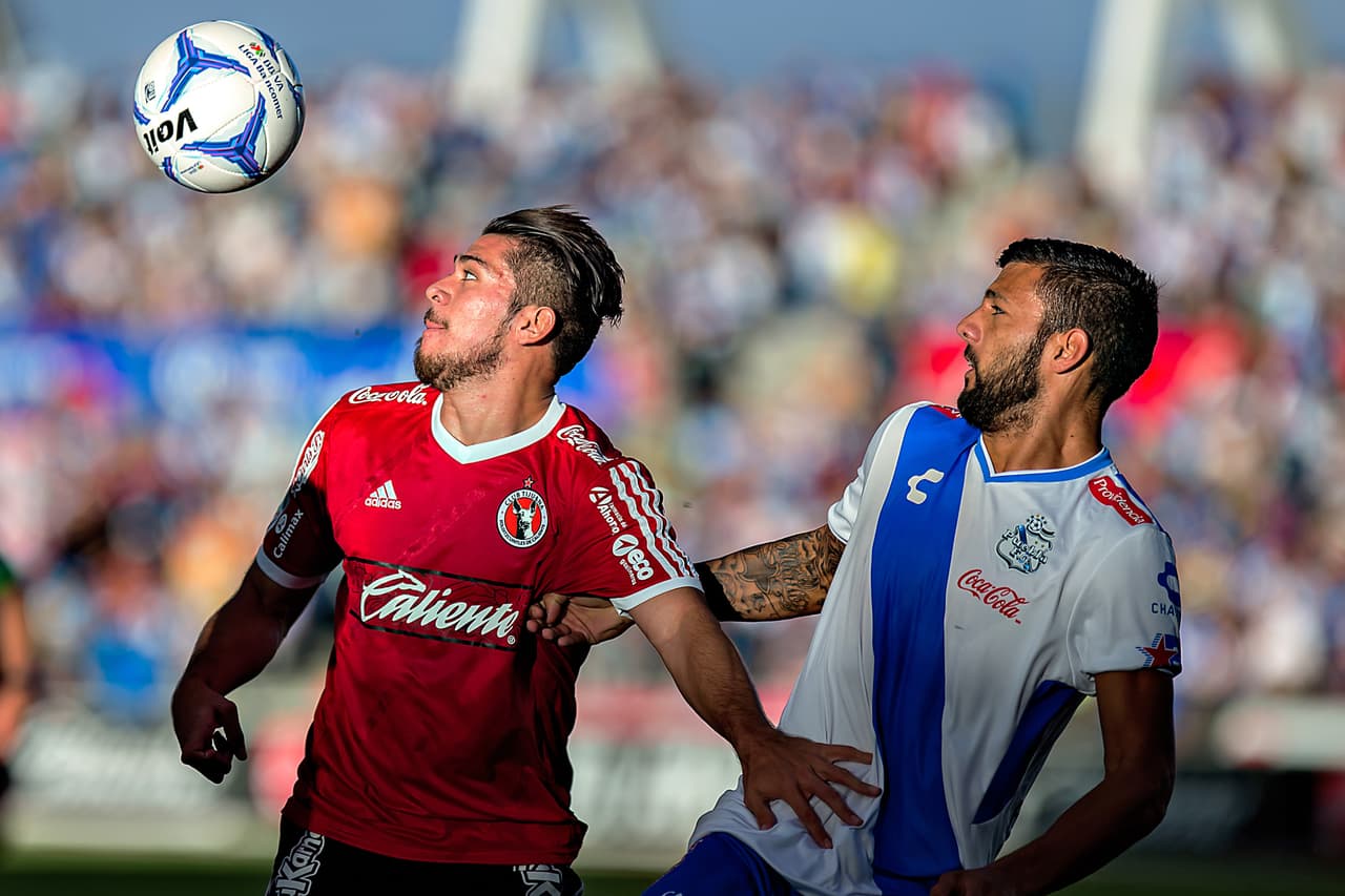 Puebla 2-1 Tijuana: Puebla gana con 9 ante Xolos