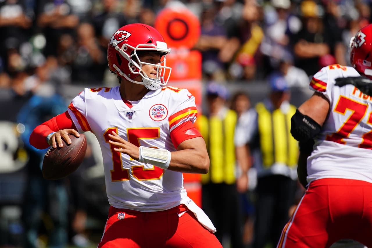 OAKLAND, CALIFORNIA - SEPTEMBER 15: Patrick Mahomes #15 of the Kansas City Chiefs throws a pass during the first quarter against the Oakland Raiders at RingCentral Coliseum on September 15, 2019 in Oakland, California. (Photo by Daniel Shirey/Getty Images)