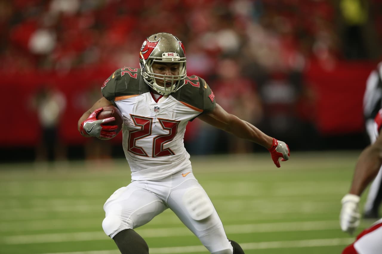 Tampa Bay Buccaneers running back Doug Martin (22) runs with the ball during an NFL football game against the Atlanta Falcons, Sunday, Sept. 11, 2016, in Atlanta. The Buccaneers won the game 31-24. (Jeff Haynes/AP Images for Panini)