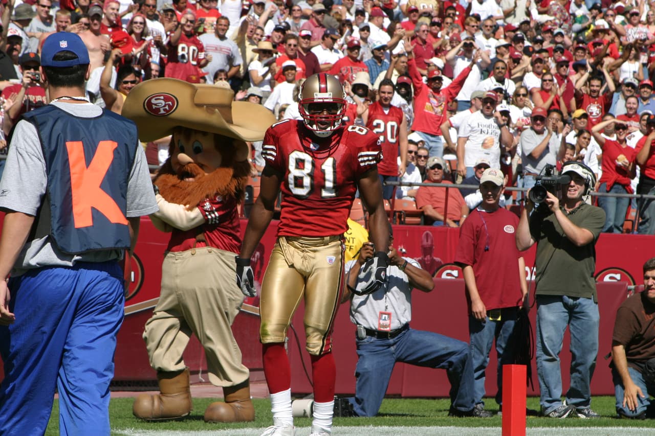 San Francisco 49ers Terrell Owens making a play with the football in a game verse the Detroit Lions on Sunday October 5, 2003 in San Francisco. (AP Photo/Kevin Reece)