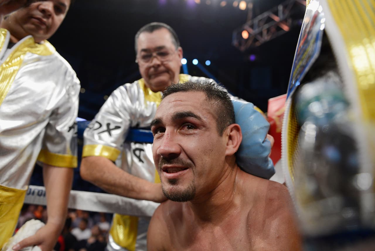 LOS ANGELES, CA - JUNE 23: Humberto Soto, from Mexico, reacts in his corner after getting knocked out by Lucas Matthysse, from Argentina, during the 12-round WBC Continental Americas Super Lightweight bout at Staples Center on June 23, 2012 in Los Angeles, California. (Photo by Kevork Djansezian/Getty Images)