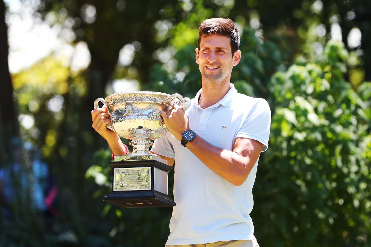 MELBOURNE, AUSTRALIA - JANUARY 28: Novak Djokovic of Serbia poses with the Norman Brookes Challenge Cup after winning the 2019 Australian Open at Picnic Point, Royal Botanical Gardens on January 28, 2019 in Melbourne, Australia. (Photo by Michael Dodge/Getty Images)