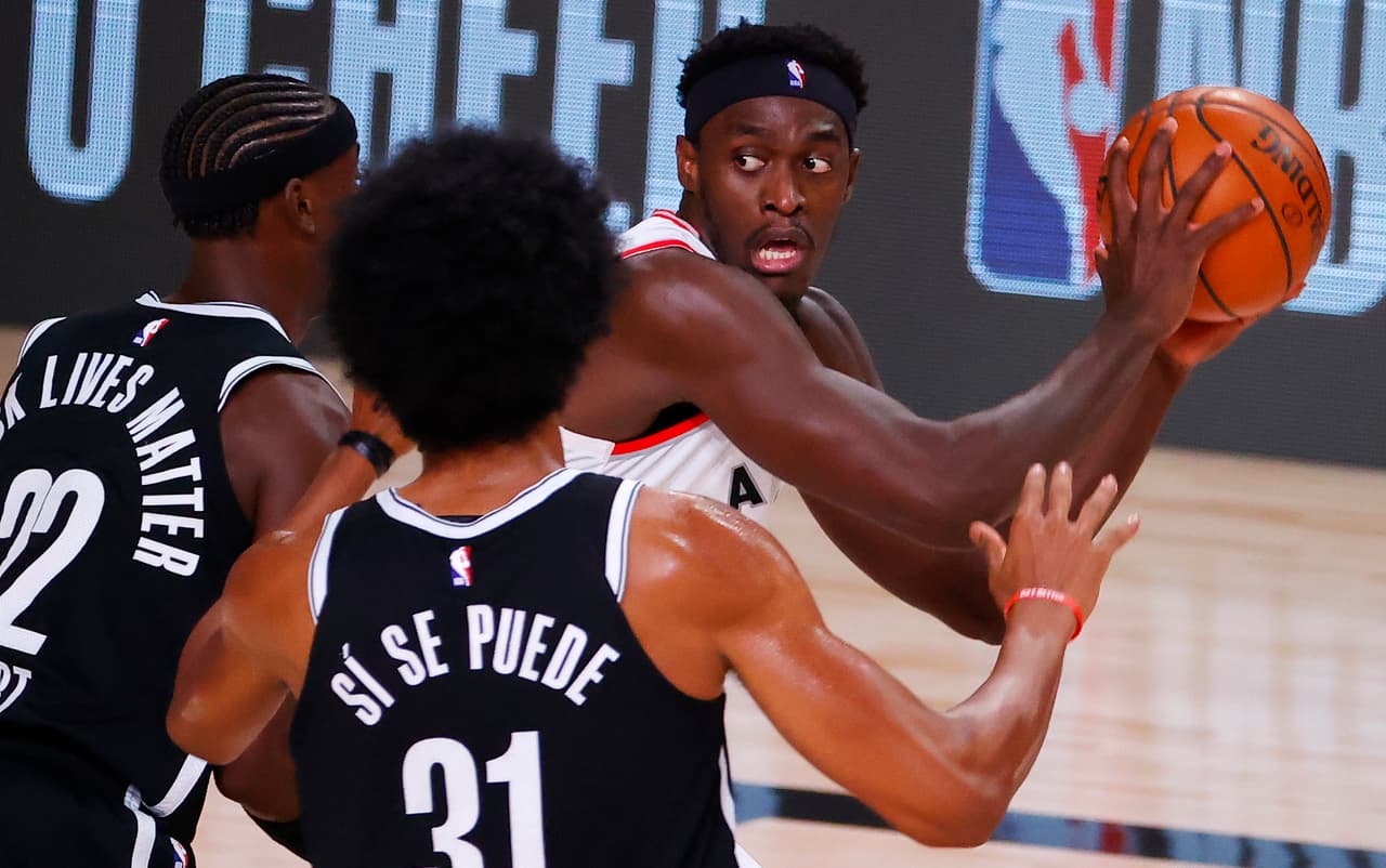 Los Raptors arrancan la defensa de su título con victoria