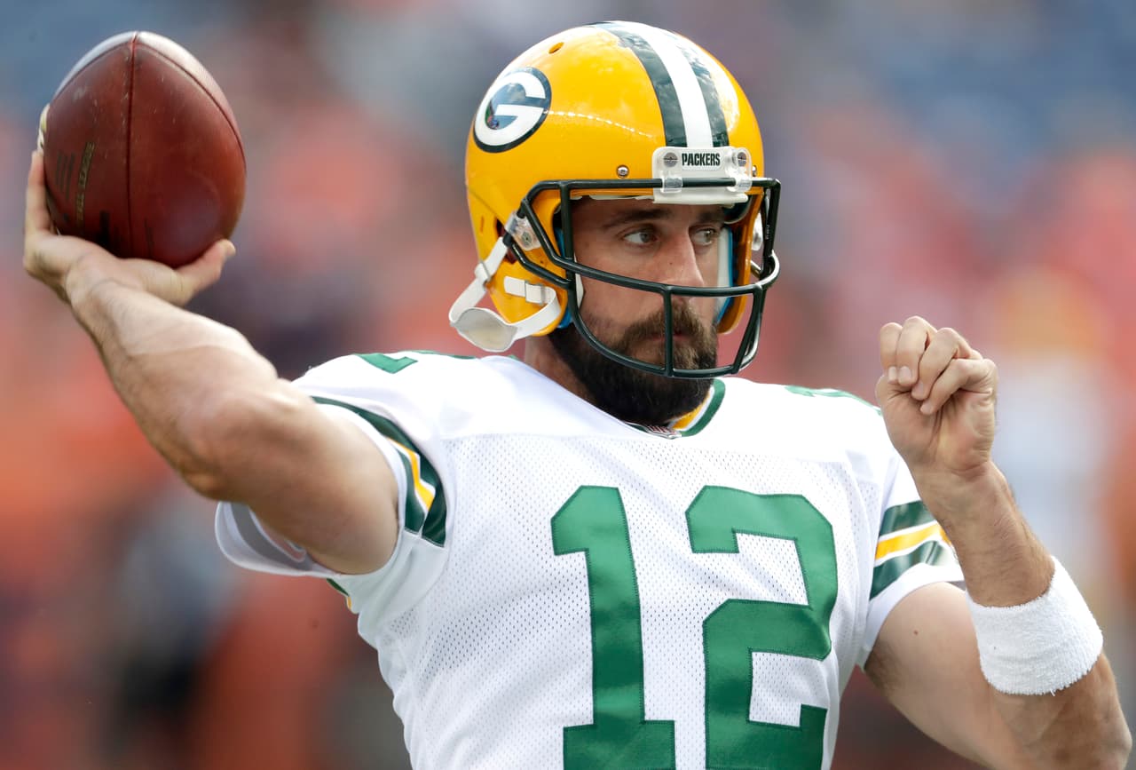 Green Bay Packers quarterback Aaron Rodgers (12) warms up prior to an NFL preseason football game against the Denver Broncos, Saturday, Aug. 26, 2017, in Denver. AP Photo/Joe Mahoney)