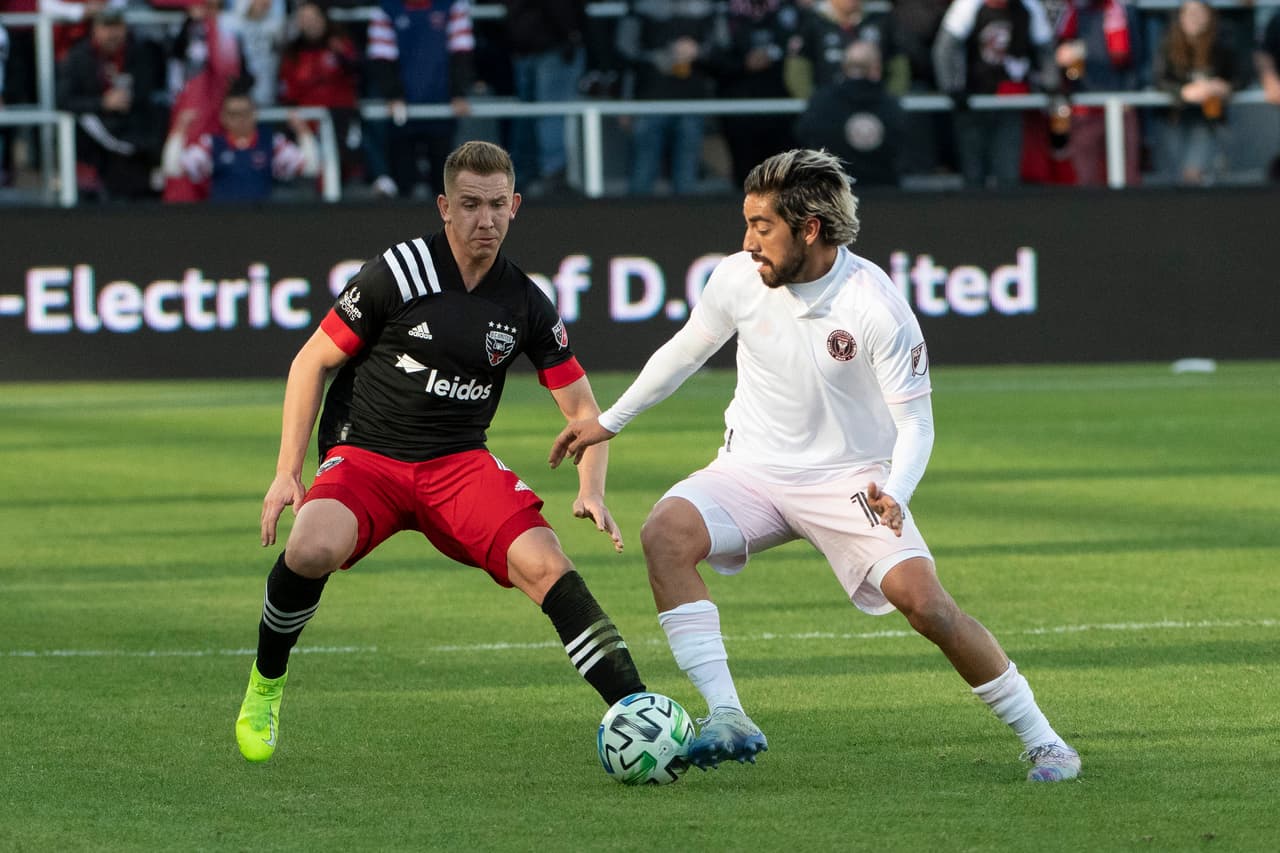 Mar 7, 2020; Washington, DC, Washington, DC, USA; Inter Miami midfielder Rodolfo Pizarro (10) dribbles as D.C. United defender Julian Gressel (31) defends during the first half at Audi Field. Mandatory Credit: Tommy Gilligan-USA TODAY Sports