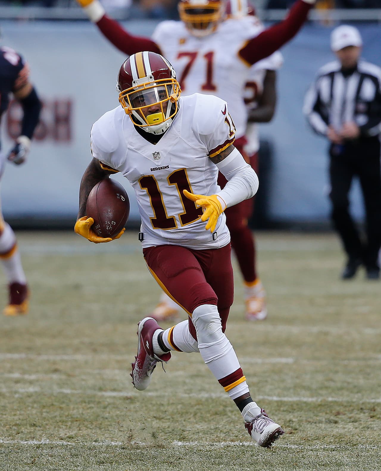 Washington Redskins wide receiver DeSean Jackson (11) runs after a catch against the Chicago Bears during the first half of an NFL football game, Saturday, Dec. 24, 2016, in Chicago. (AP Photo/Charles Rex Arbogast)