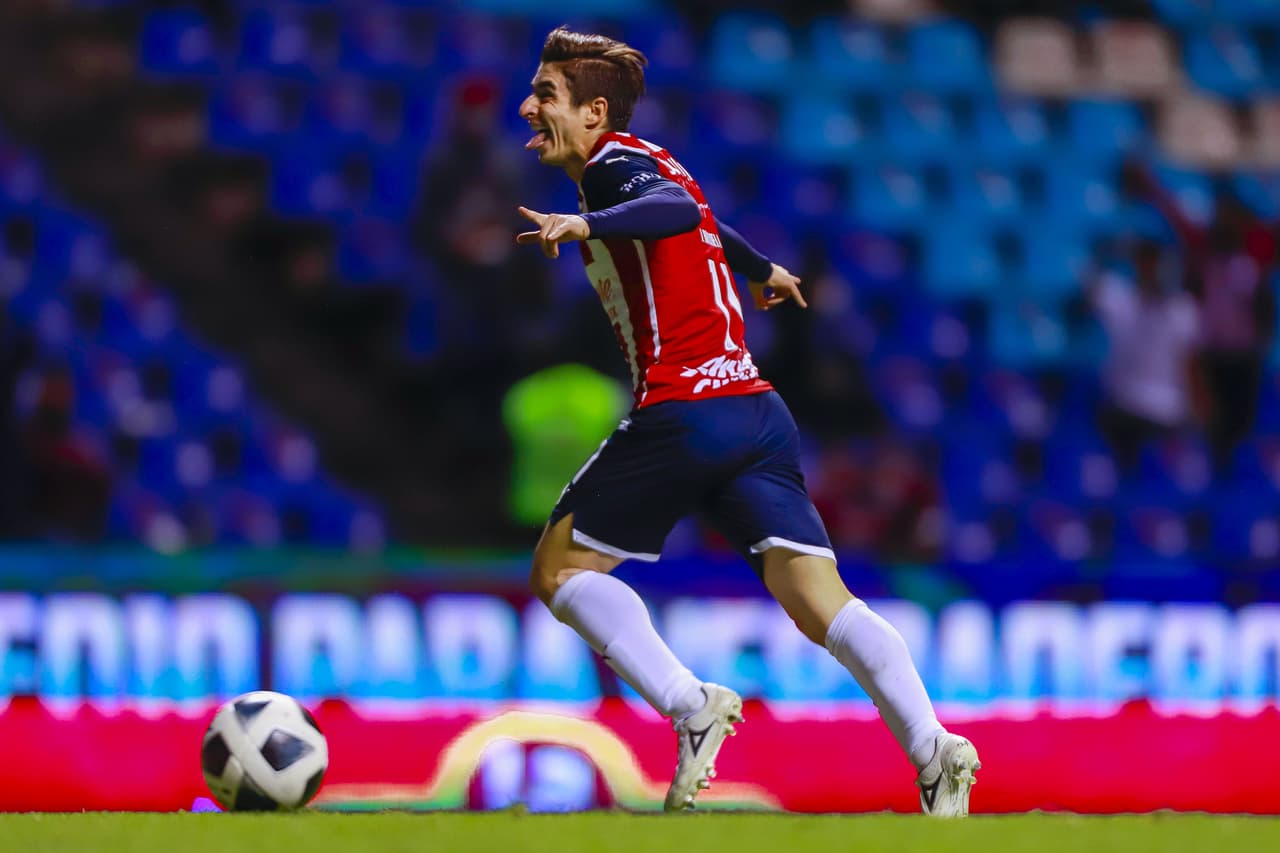Isaac Brizuela celebrates his goal 0-2 of Guadalajara during the game Puebla vs Guadalajara, corresponding to Day 02 of the Torneo Apertura Grita Mexico A21 of the Liga BBVA MX, at Cuauhtemoc Stadium, on July 30, 2021. 
<br>
<br> Isaac Brizuela celebra su gol 0-2 de Guadalajara durante el partido Puebla vs Guadalajara, Correspondiente a la Jornada 02 del Torneo Apertura Grita Mexico A21 de la Liga BBVA MX, en el Estadio Cuauhtemoc, el 30 de de Julio de 2021.