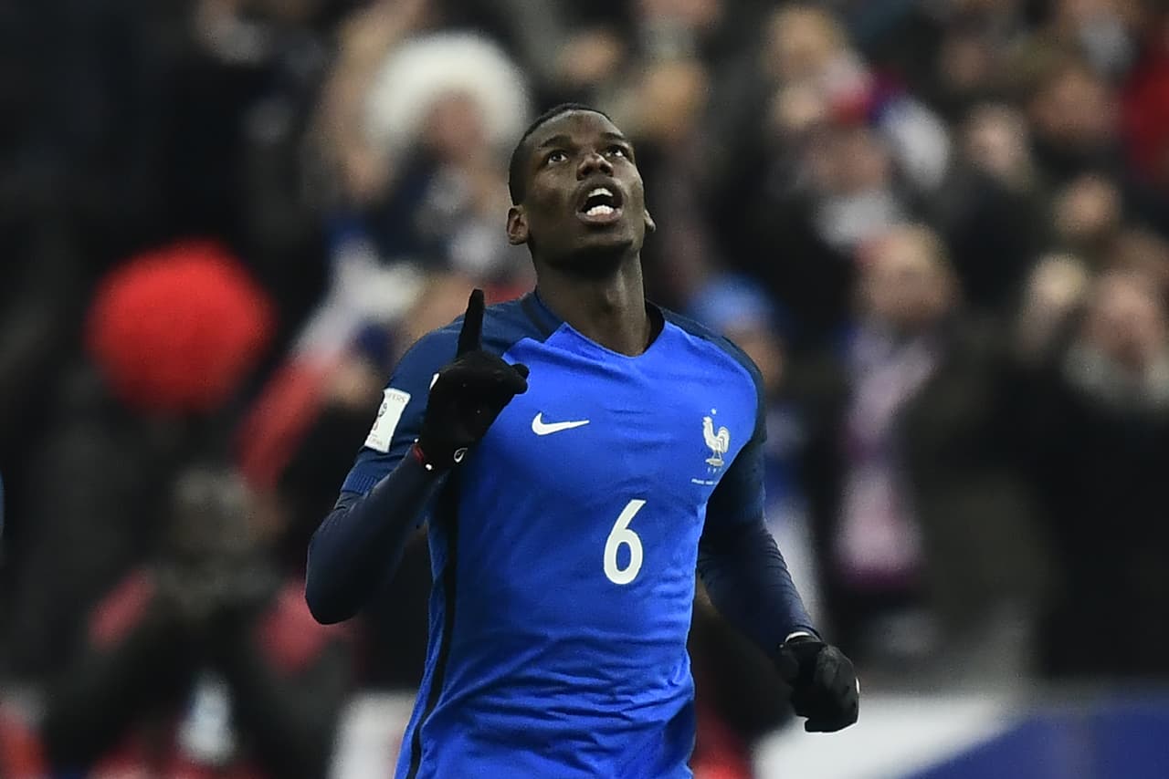 France's midfielder Paul Pogba celebrates after scoring a goal during the 2018 World Cup group A qualifying football match between France and Sweden at the Stade de France in Saint-Denis, north of Paris, on November 11, 2016. / AFP / MIGUEL MEDINA (Photo credit should read MIGUEL MEDINA/AFP/Getty Images)
