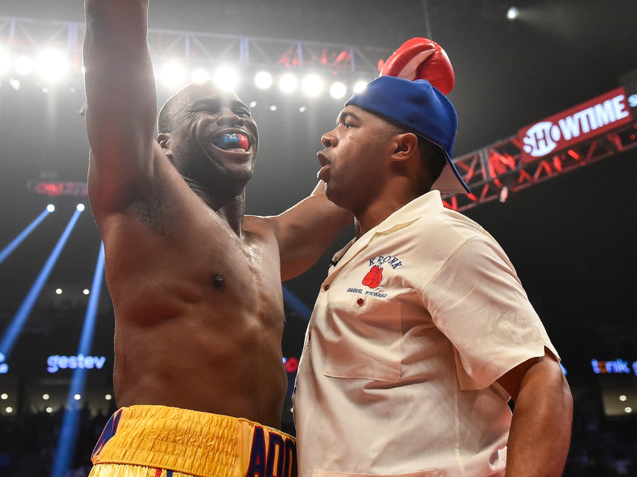 MONTREAL, QC - JUNE 03: Adonis Stevenson (left) reacts with trainer SugarHill Steward (right) after defeating Andrzej Fonfara in the second round during the WBC light heavyweight world championship match at the Bell Centre on June 3, 2017 in Montreal, Quebec, Canada. Adonis Stevenson defeated Andrzej Fonfara in the second round by way of technical knockout. (Photo by Minas Panagiotakis/Getty Images)