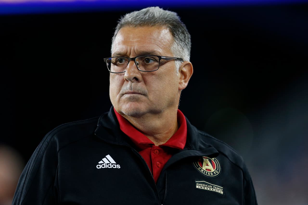 May 30, 2018; Foxborough, MA, USA; Atlanta United FC manager Gerardo Martino reacts on the side line during the second half against the New England Revolution at Gillette Stadium. Mandatory Credit: Greg M. Cooper-USA TODAY Sports