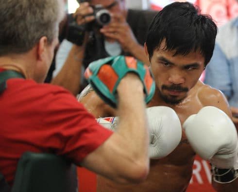 El filipino Manny Pacquiao entrena duro y a conciencia para su próxima pelea por el título welter contra Miguel Cotto.
