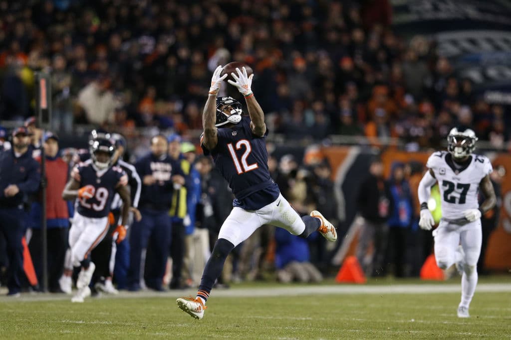 CHICAGO, ILLINOIS - JANUARY 06: Allen Robinson #12 of the Chicago Bears completes a reception against the Philadelphia Eagles in the second half of the NFC Wild Card Playoff game at Soldier Field on January 06, 2019 in Chicago, Illinois. (Photo by Dylan Buell/Getty Images)