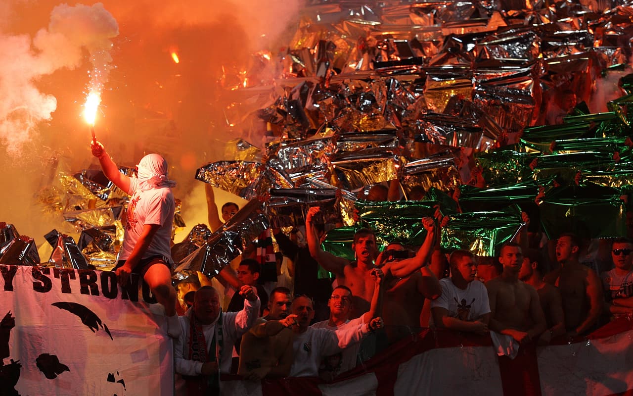 ROME, ITALY - SEPTEMBER 19: Legia Warszawa fans support their team during the Uefa Europa League Group J match between SS Lazio and Legia Warszawa at Stadio Olimpico on September 19, 2013 in Rome, Italy. (Photo by Paolo Bruno/Getty Images)