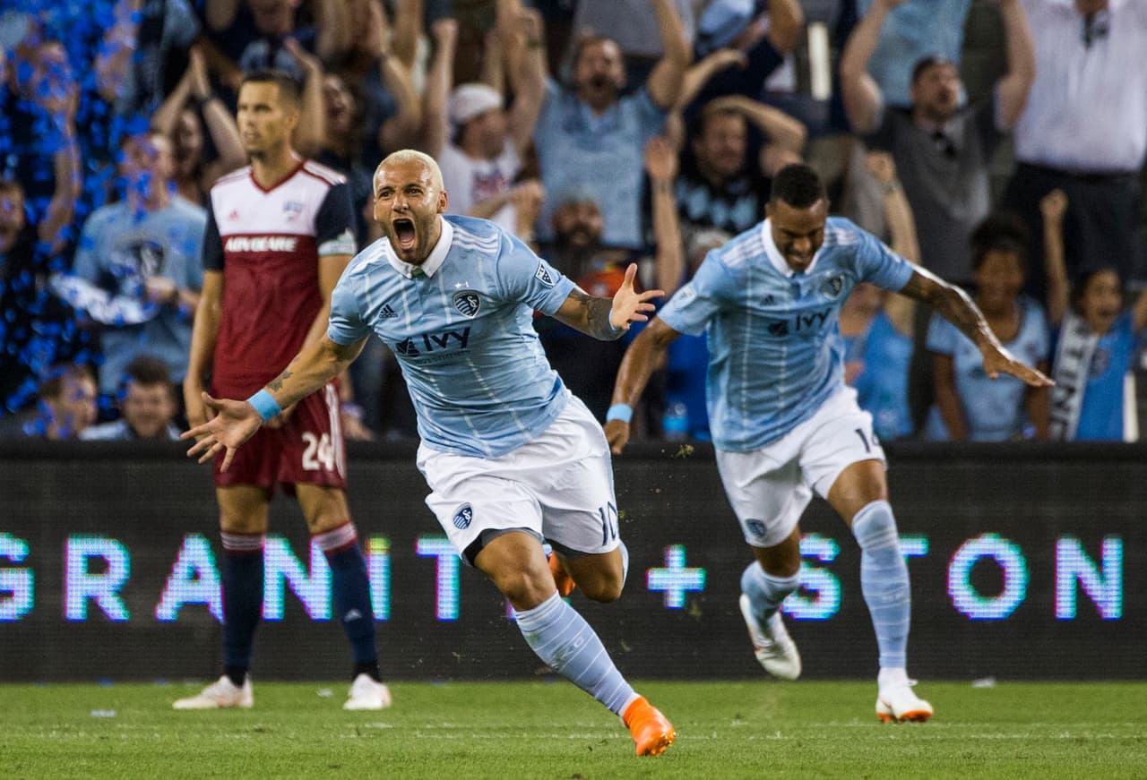 Jun 16, 2018; Kansas City, KS, USA; Sporting Kansas City midfielder Yohan Croizet (10) celebrates after scoring against FC Dallas in the second half at Children's Mercy Park. Mandatory Credit: Jay Biggerstaff-USA TODAY Sports