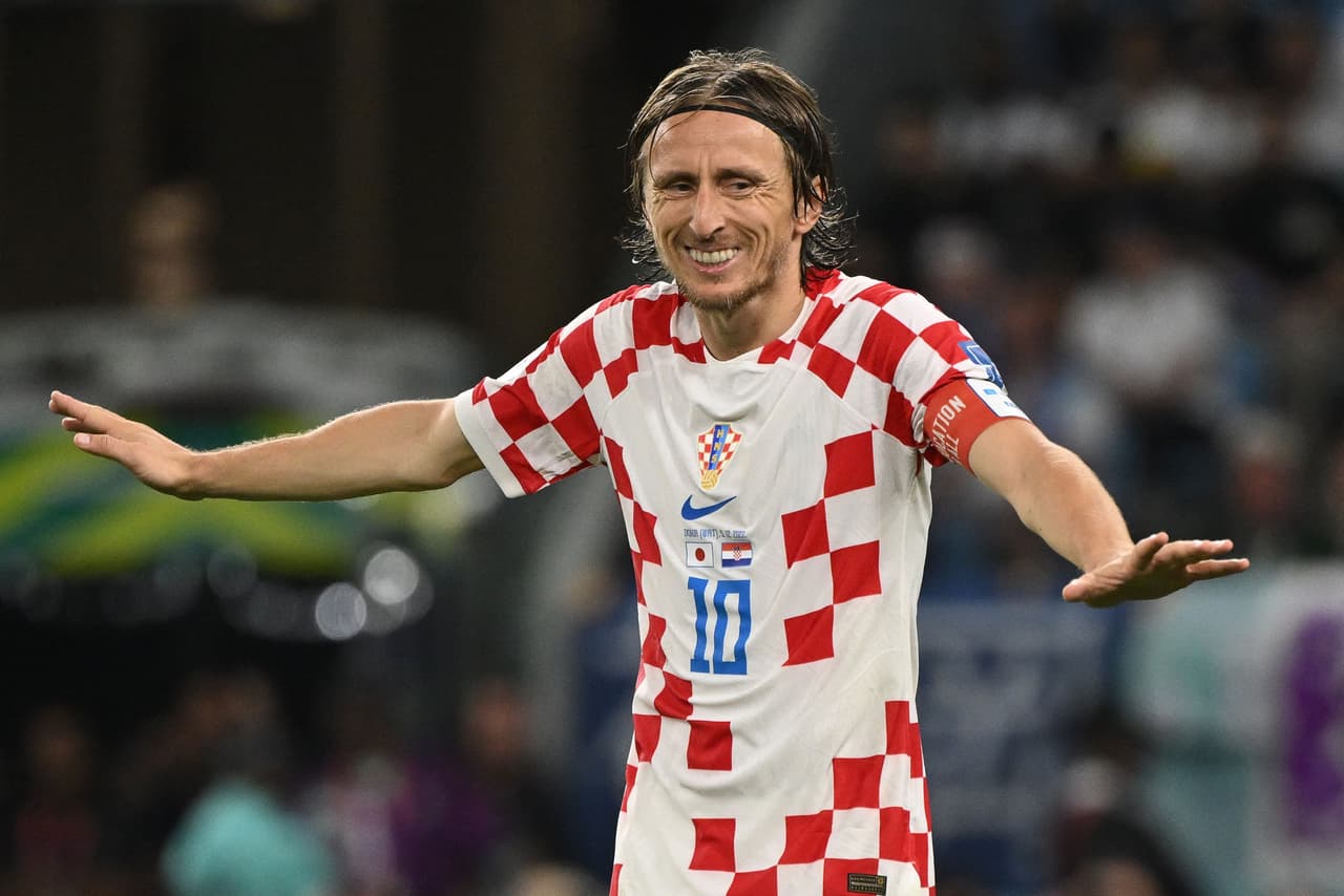 Croatia's midfielder #10 Luka Modric gestures as he is substituted during the Qatar 2022 World Cup round of 16 football match between Japan and Croatia at the Al-Janoub Stadium in Al-Wakrah, south of Doha on December 5, 2022. (Photo by ANDREJ ISAKOVIC / AFP) (Photo by ANDREJ ISAKOVIC/AFP via Getty Images)