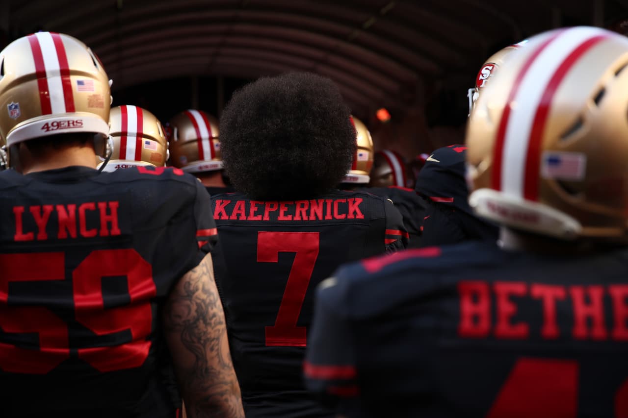 SANTA CLARA, CA - OCTOBER 06: Colin Kaepernick #7 of the San Francisco 49ers walks on the field with teammates prior to their NFL game against the Arizona Cardinals at Levi's Stadium on October 6, 2016 in Santa Clara, California. (Photo by Ezra Shaw/Getty Images)