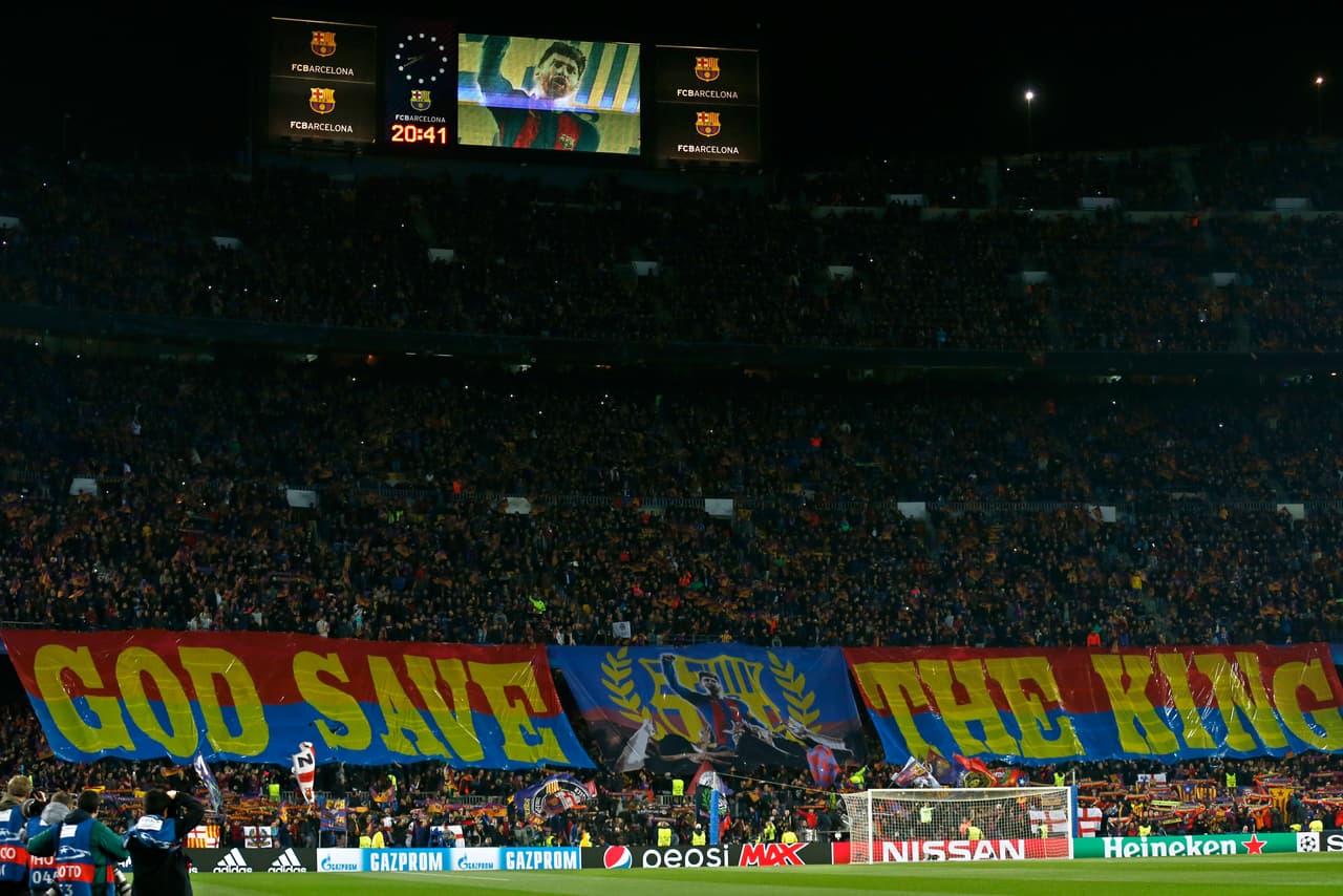 Barcelona supporters display a banner with a picture of Lionel Messi during the Champions League round of sixteen second leg soccer match between FC Barcelona and Chelsea at the Camp Nou stadium in Barcelona, Spain, Wednesday, March 14, 2018. (AP Photo/Manu Fernandez)